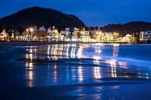 Golden sands and dramatic cliffs at Playa Cerro Hermoso with panoramic Pacific views.